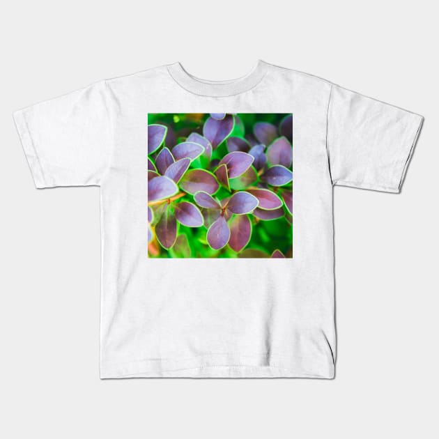 Vibrant green and purple leaves Kids T-Shirt by PLdesign